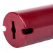 A red plastic Robot Coupe small replacement pusher cylinder with a hole in it.
