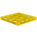 A Vollrath yellow plastic tray with 12 compartments and holes.