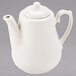 A white Homer Laughlin China beverage server with a lid.
