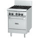 A white Garland natural gas range with black knobs.