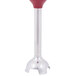 A close-up of a KitchenAid immersion blender's red blending arm.