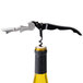 A Franmara Duo-Lever waiter's corkscrew with a black enamel handle and Smart-Kut cutter opening a bottle of wine.