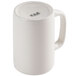 A CAC white china mug with a handle.