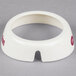 A white circular plastic Tablecraft salad dressing dispenser collar with maroon lettering.