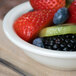 Choice 3.5 oz. Ivory (American White) Rolled Edge Stoneware Fruit Bowl / Monkey Dish - 36/Case Main Thumbnail 5