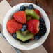 Choice 3.5 oz. Ivory (American White) Rolled Edge Stoneware Fruit Bowl / Monkey Dish - 36/Case Main Thumbnail 4