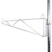 A Metro chrome wall mount shelf support pole with a metal rod.