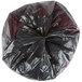 A black circular Berry trash bag with a red top.