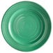 A close up of a Tuxton Concentrix cilantro green plate with a spiral pattern.