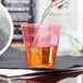 Fineline Quenchers 402-RD 2 oz. Neon Red Hard Plastic Shot Cup - 2500/Case Main Thumbnail 1