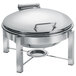 A round stainless steel Eastern Tabletop chafer with a hinged dome lid on a stand.