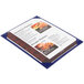 A Menu Solutions blue menu board on a table.