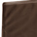 A Menu Solutions brown leather check presenter.