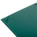 A close-up of a green rectangular Menu Solutions menu board.