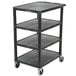 A black plastic Luxor serving cart with 4 shelves on wheels.
