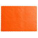 An orange paper placemat with scalloped edges.