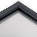 A black Avantco solid right hinged door frame.