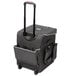 A black Rubbermaid rolling luggage bag with handles.
