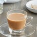A glass cup of Caffe de Aroma Authentic Chai Tea.