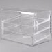 A clear plastic Cal-Mil pastry display case with three shelves.