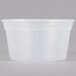 A white plastic Pactiv deli container with a lid.