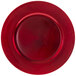 A close up of a 10 Strawberry Street red lacquer round charger plate with a round edge.