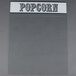 A clear plastic panel with the word "popcorn" in white.