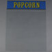 The replacement glass panel for a Paragon popcorn popper with a blue and yellow sign.