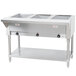 An Advance Tabco stainless steel electric steam table with undershelf holding three pans on a counter.