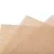 Three pieces of Bagcraft Packaging parchment paper on a white background.