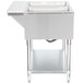 An Advance Tabco stainless steel electric hot food table with undershelf holding two trays.