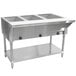 An Advance Tabco stainless steel electric hot food table with sealed wells holding three pans.