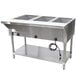 An Advance Tabco stainless steel hot food table with three sealed wells on a counter.