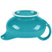 A turquoise china gravy boat with a white rim.