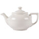 A Hall China ivory teapot with a lid and handle on a white background.