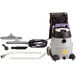 A black and purple ProTeam wet/dry vacuum cleaner with a handle and hose.