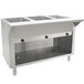 An Advance Tabco stainless steel hot food table with three open wells.