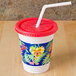 Solo CC12C-J5145 12-14 oz. Jungle Print Plastic Kid's Cup with Lid and Straw - 250/Case Main Thumbnail 1