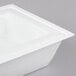 A white square porcelain bowl with a square lid.