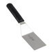 A black and white Mercer Culinary square edge turner with a black handle.