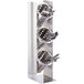 A Cal-Mil stainless steel vertical rack with 3 metal containers holding spoons and forks.