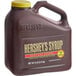 A brown plastic jug of HERSHEY'S Special Dark Chocolate Syrup with a yellow lid.