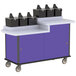 A purple and white Lakeside condiment cart with black and white objects on it.