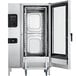 A large stainless steel Convotherm roll-in combi oven with the door open.
