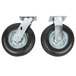 Two Rubbermaid Pneumatic casters with black rubber tires and silver and black hardware.