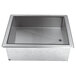 A stainless steel Advance Tabco drop-in ice cooled unit with a drain over a white counter.