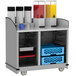 A Lakeside stainless steel full-service hydration cart with containers of liquid and milk on the shelves.