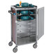 A Lakeside stainless steel meal delivery cart with trays of dishes.
