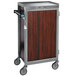 A stainless steel and walnut Lakeside meal delivery cart.