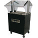 An Advance Tabco stainless steel hot food table with a black and clear cover on a black and silver cart.